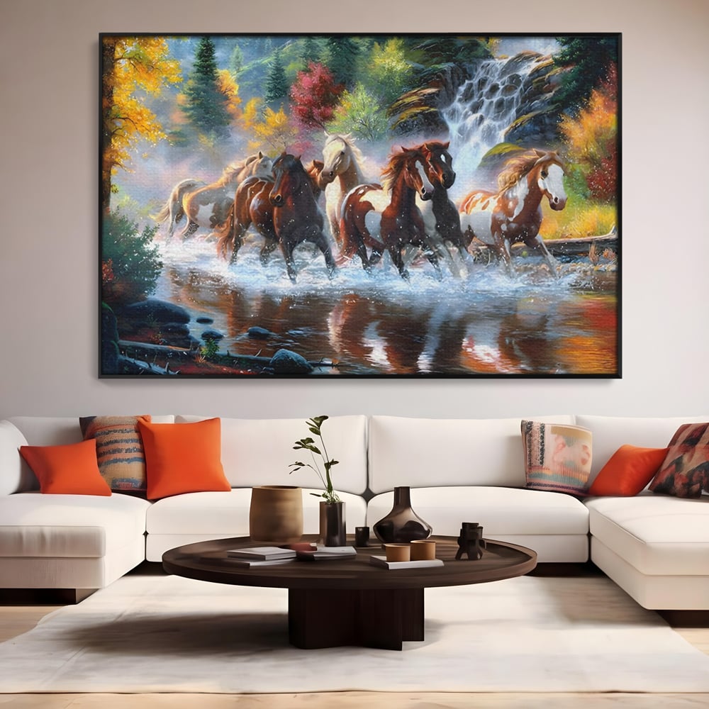 Tablou canvas cu tablou canvas cu cai galopand prin apa, in rama de aluminiu negru, pe perete intr-un living